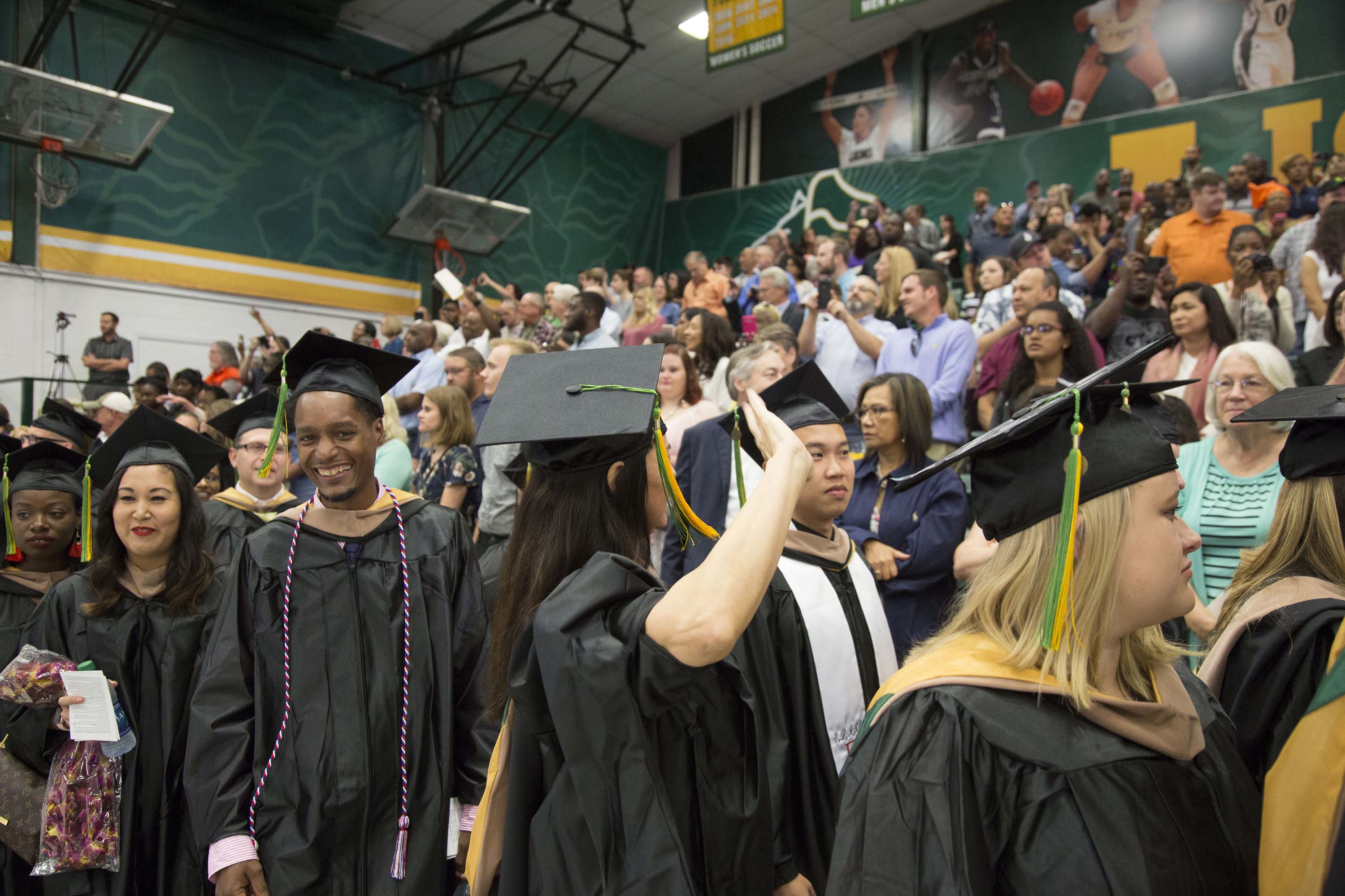 University Campus Filled with Happy New Graduates and Families for 2018